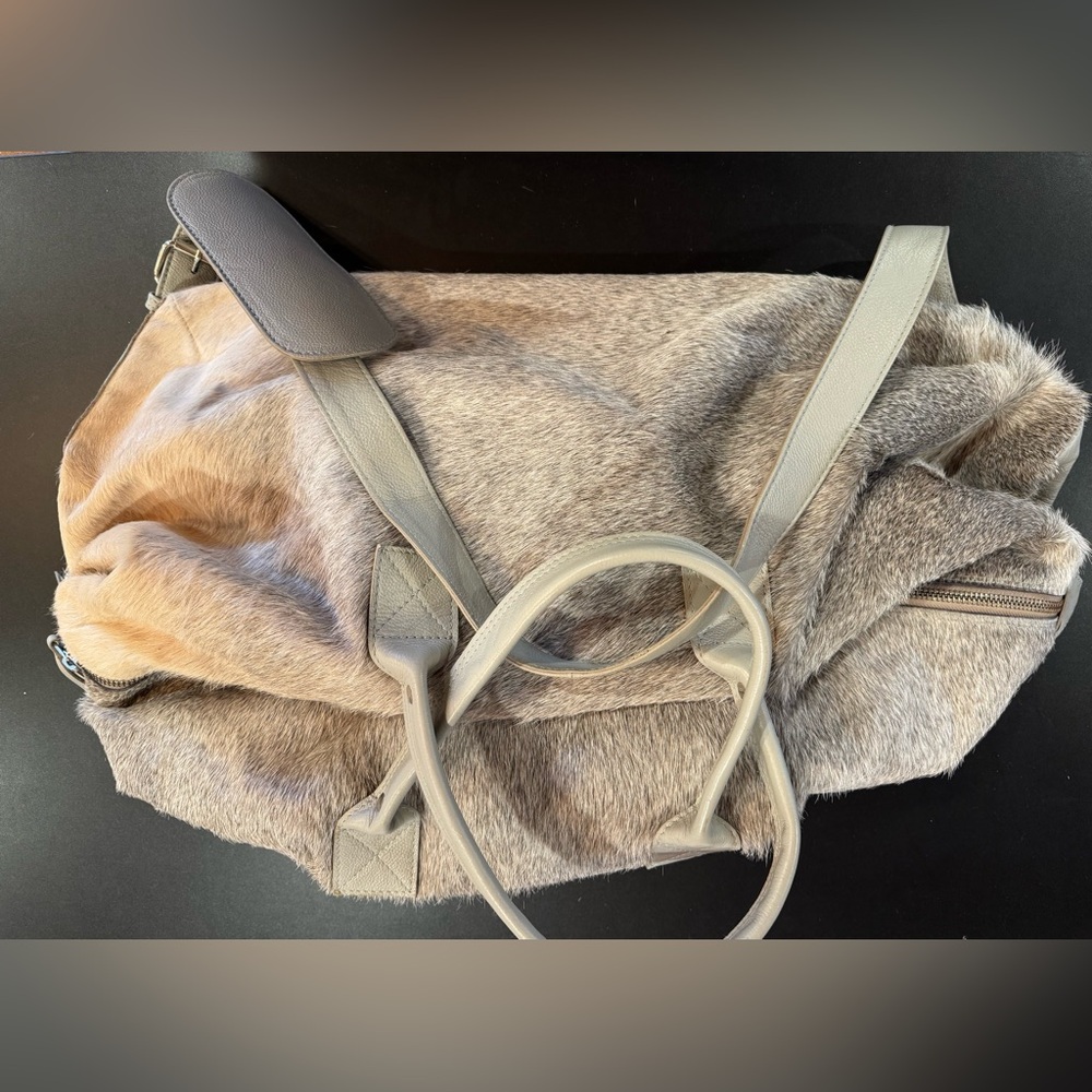 Madison’s Inc Cowhide duffle